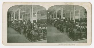 Two photographs of the interior of a retail store, with articles of clothing displayed on table ...