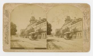 Pictures show a horse drawn streetcar on the road in front of a large four story hotel building
