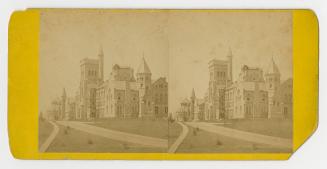Pictures show a large collegiate gothic building. 
