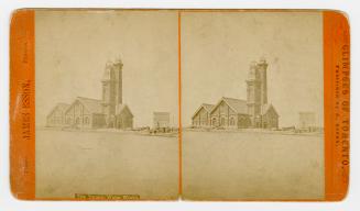 Pictures show a large industrial building with two towers.