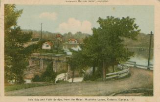 Colorized photograph of a highway running across a bridge spanning a waterfall.