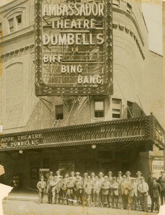 Black and white photograph of the cast of the Dumbells in Biff! Bing! Bang! posing in front of  ...