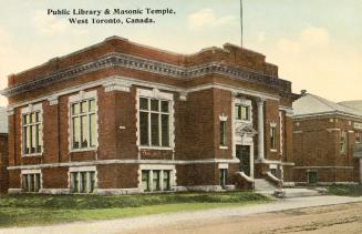 Large brick, one and a half storey public library and Masonic Temple building. 