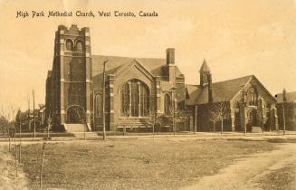 Picture of large church building with square tower on left side. 
