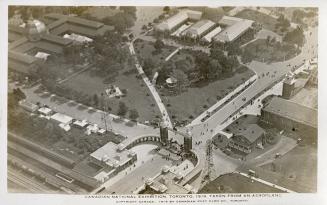 Aerial shot of large of large buildings in exhibition grounds. B & W.