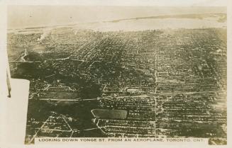 Aerial shot of a large city. Black and white.