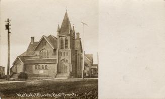 Picture of large church building with wide white border on the right side. 