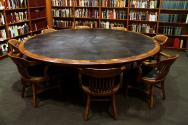 A large, round wooden table.