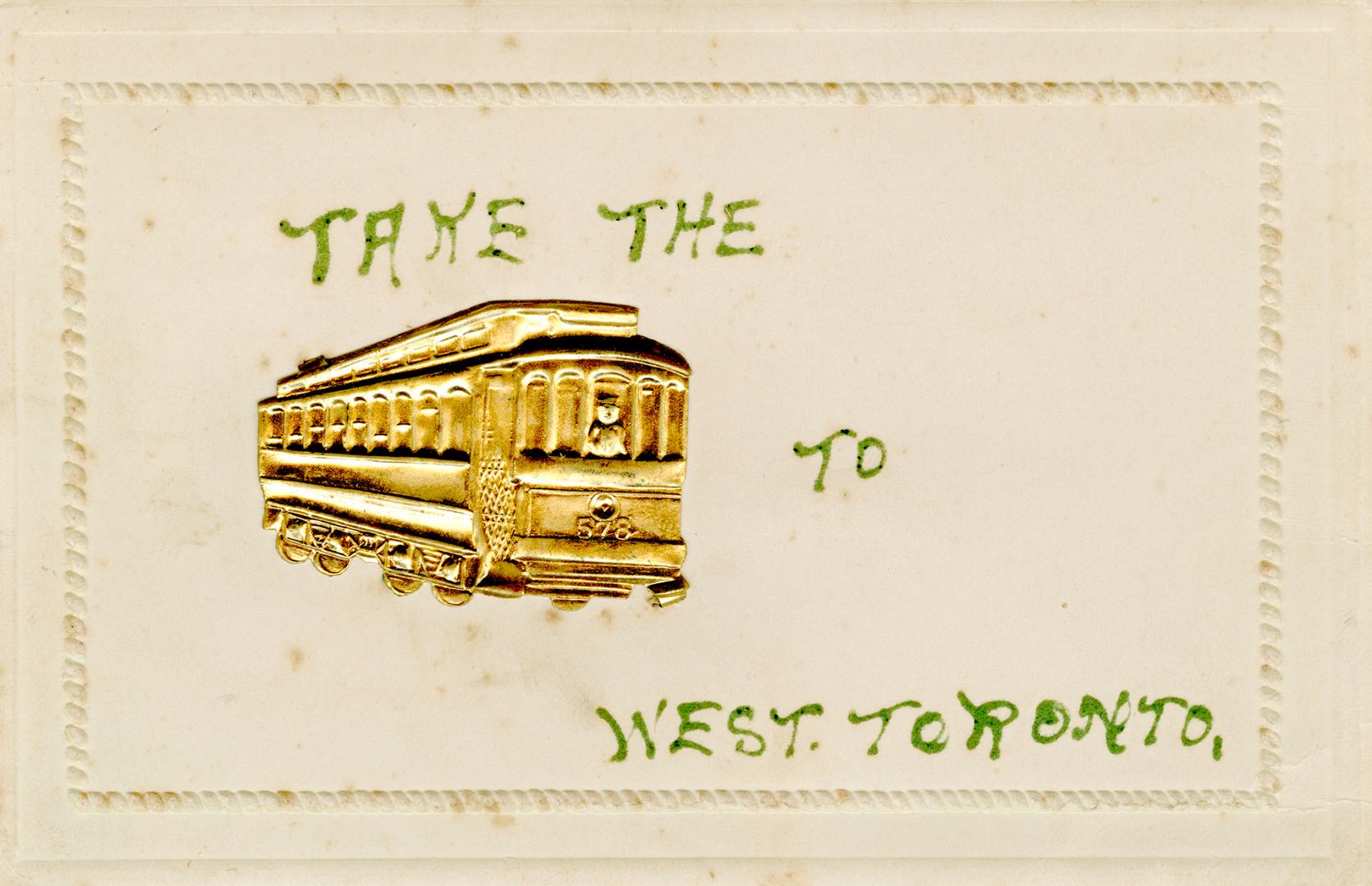 White card with streetcar made of tin. 