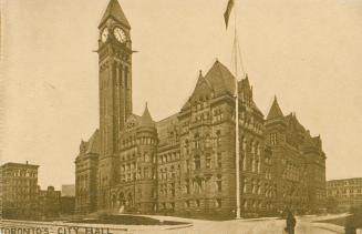 Sepia toned photograph of a large Richardsonian Romanesque building with a central clock tower.