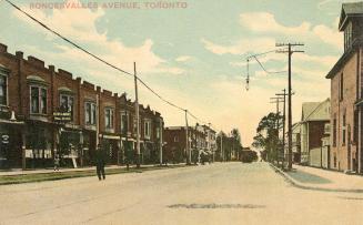 Colorized photograph of a city street in a residential area.