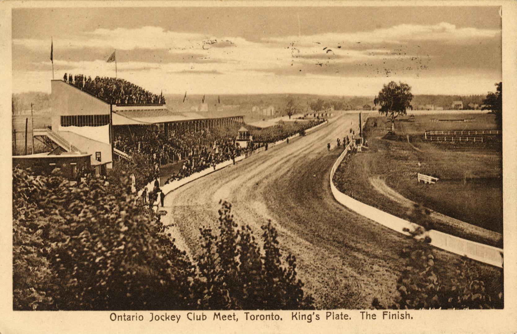Picture of a racetrack and large grandstand. 