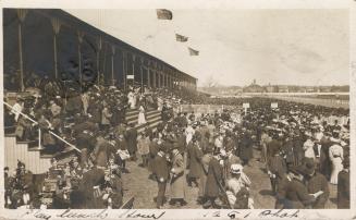 Picture of a racetrack and large grandstand. 