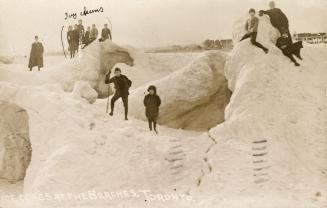 Picture of several people standing on ice formations. 