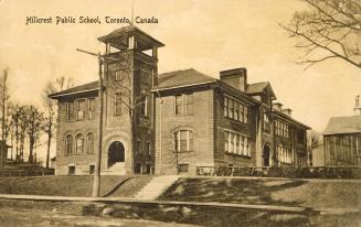 Sepia toned photograph of a two story school building.