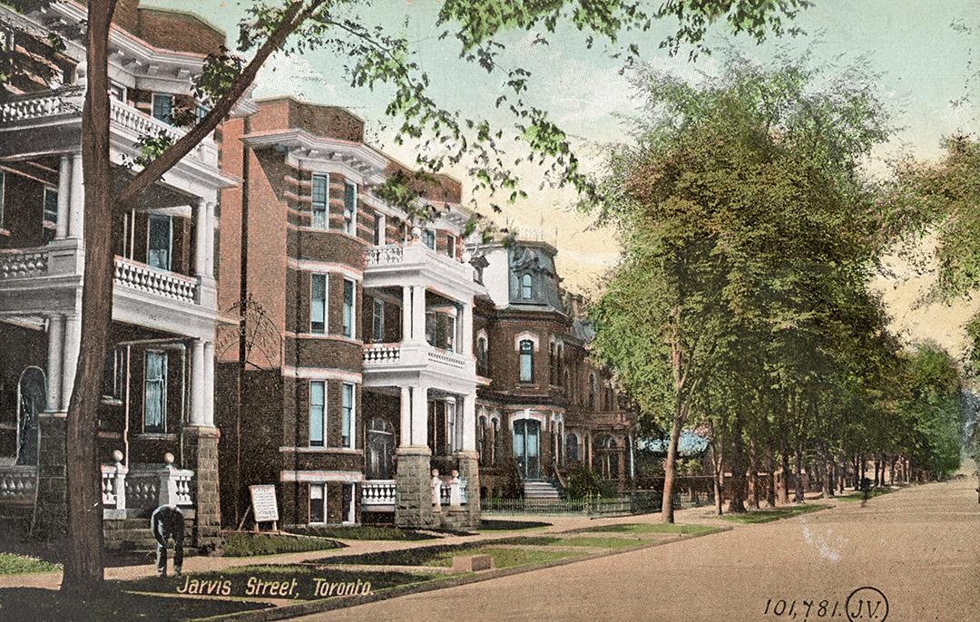 Colorized picture of two, three story apartment buildings on a street lined with luxury buildin ...