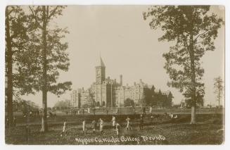 Black/white postcard depicting the main building and lawns at Upper Canada College in Toronto.  ...