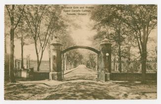 Sepia-toned postcard depicting the entrance gate at Upper Canada College in Toronto. Caption st ...