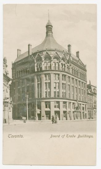 Sepia toned photograph of an early skyscraper with a curved roof.