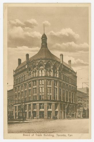 Sepia toned photograph of an early skyscraper with a curved roof.