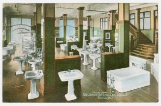 Picture of a plumbing showroom with sinks and bath tubs. 
