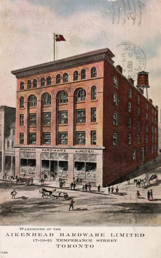 Colorized photograph of a large, five story building on a street corner.