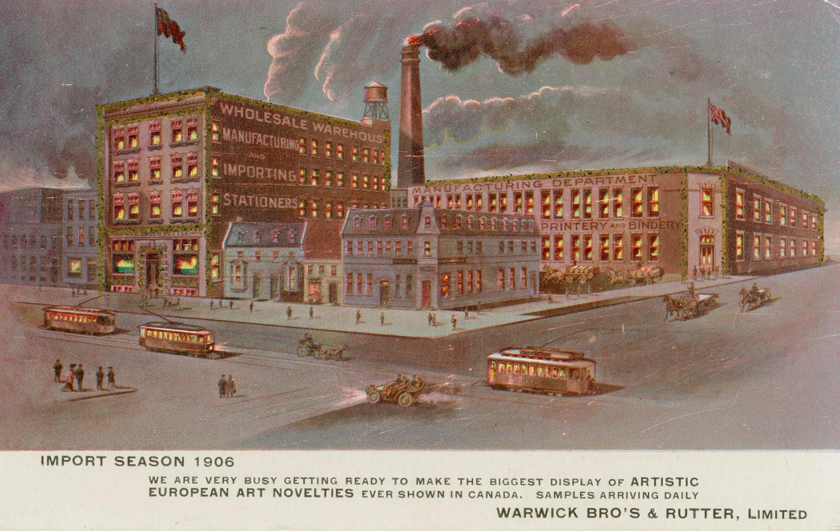 Picture of large stationary manufacturing factory on a busy street corner. 