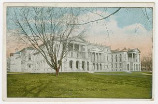 Picture of law buildings facing large front lawn. 