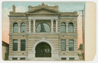 Picture of two storey library building. 