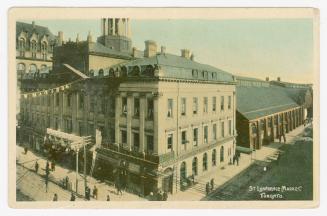 Color photographs of very large public city buildings used for retail.