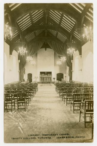 Sepia-toned postcard depicting a photo of the interior of the library and temporary chapel at T ...