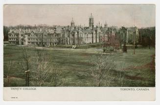 Colour postcard depicting a photo of the exterior of Trinity College and surrounding land, with ...
