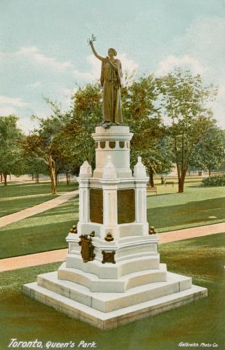 Colorized photograph of a statue of a woman in flowing robes in a large urban park.