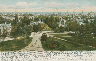 Colorized photograph (aerial view) of people walking on pathways and lawn in a large urban park ...