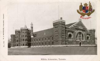 Black and white photograph of a very large Romanesque Revival, castle-like structure. White bor…