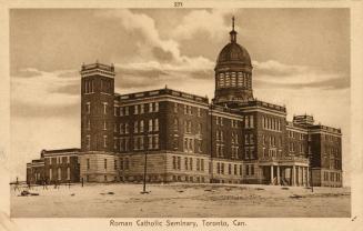 Sepia-toned postcard depicting a photo of the exterior of St. Augustine's seminary, with captio ...