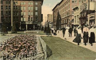 Colour postcard depicting a photo of the exterior of the garden and sidewalk in front of City H ...