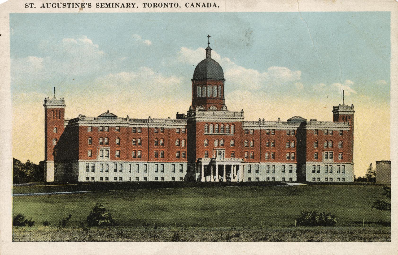 Colour postcard depicting a photo of the exterior of St. Augustine's seminary, with caption, "S ...
