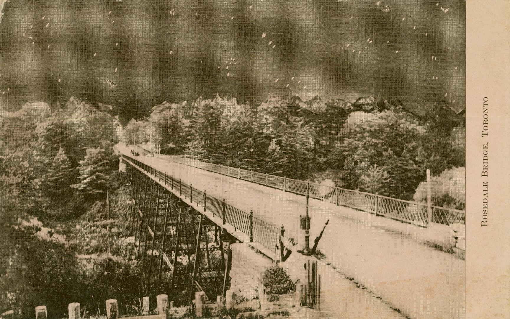 Sepia-toned postcard depicting a photo of the Rosedale Bridge and ravine, with caption, "Roseda ...