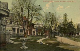 Colour postcard depicting a residential neighbourhood, with several homes, front lawns, and wal ...