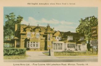 Colorized photograph of two very large homes joined together. Restaurant sign is at the entranc ...