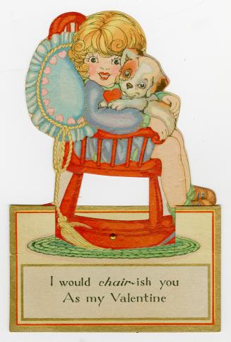 A mechanical card. A smiling woman sits in a red rocking chair holding a puppy. Between the pup ...