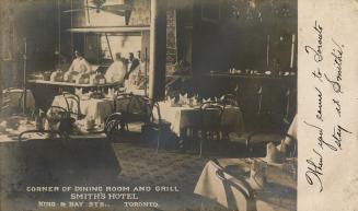 Faded grey-toned postcard depicting an image of the inside of a dining room at Smith's Hotel wi ...