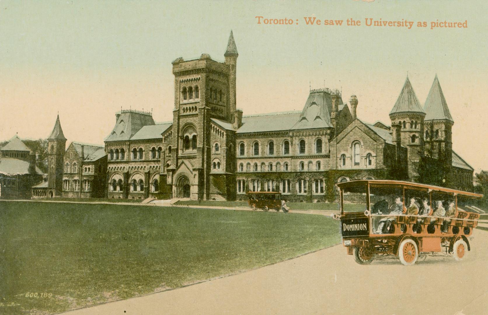 Colorized photograph of a very large stone building with many towers. Sight seeing bus on road …