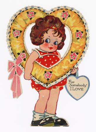A girl holds a huge yellow, heart-shaped wreath decorated with pink flowers. Because the centre ...
