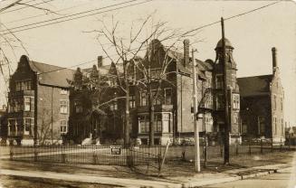 Black and white photo postcard depicting a building known as Annesley Hall on Queen's Park Cres…