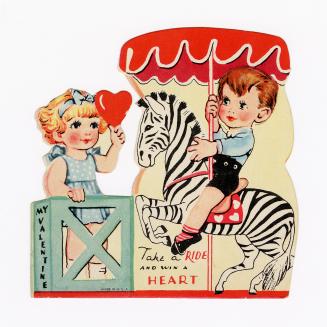 A boy sits on a toy zebra ride, perhaps a carousel, while a girl stands behind a gate holding a ...