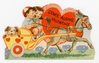 "Come along valentine" - A couple in a donkey-pulled carriage. 