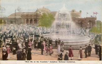 Colorized photograph of a huge crowds of people walking in front of a very large, marble founta ...