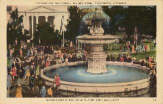 Colorized photograph of crowds of people walking in front of a very large, marble fountain whic ...